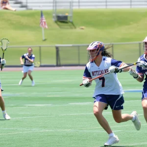 Robert Morris lacrosse team celebrates after their overtime win