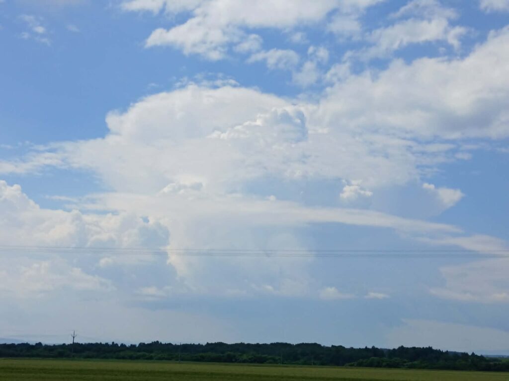 Storm clouds building over open country