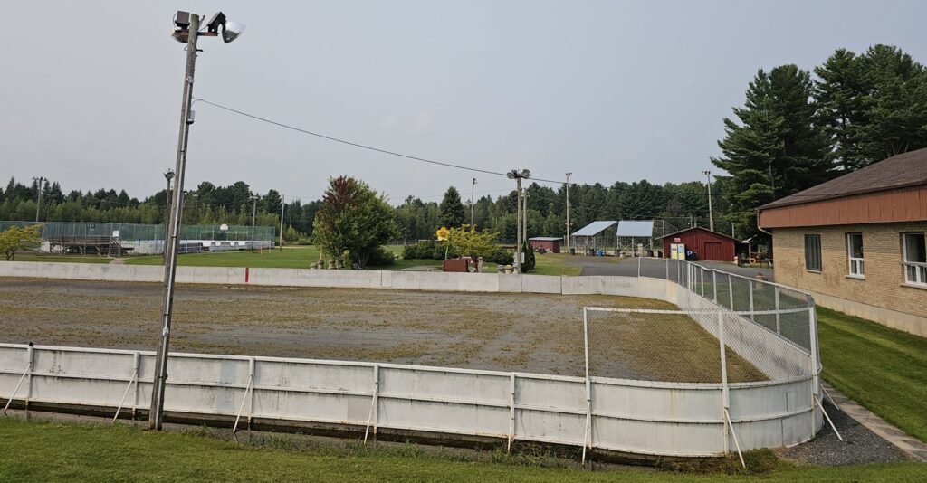 Outdoor hockey rink with boards