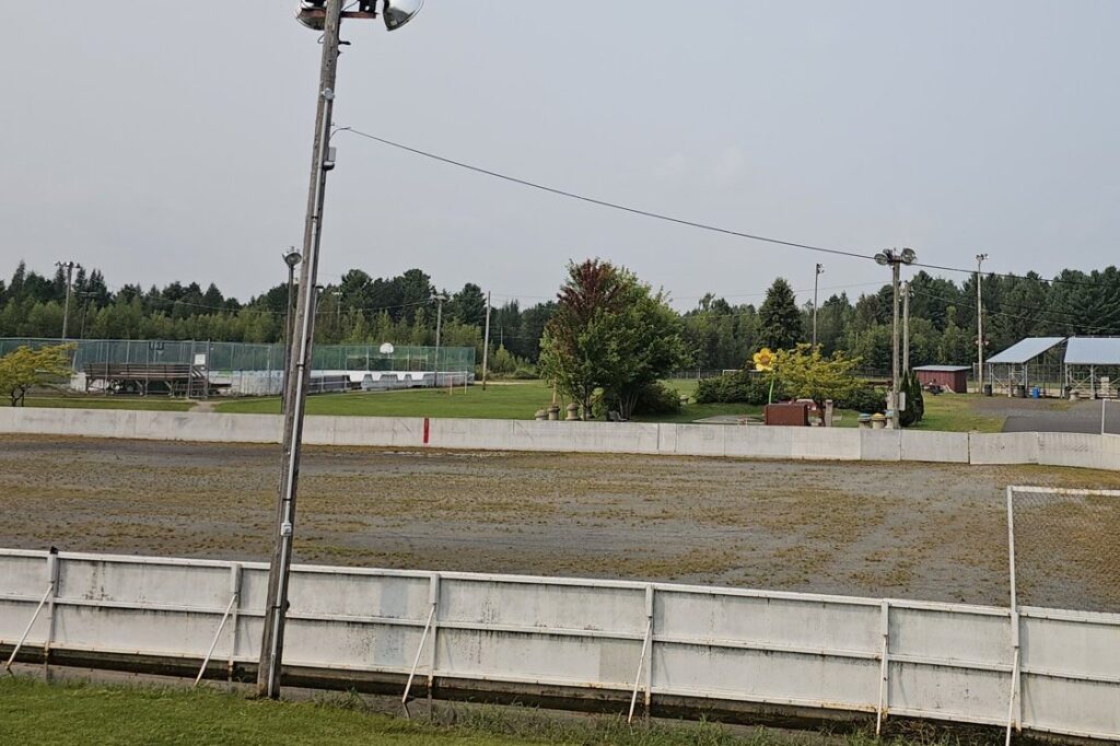 Outdoor hockey rink with boards