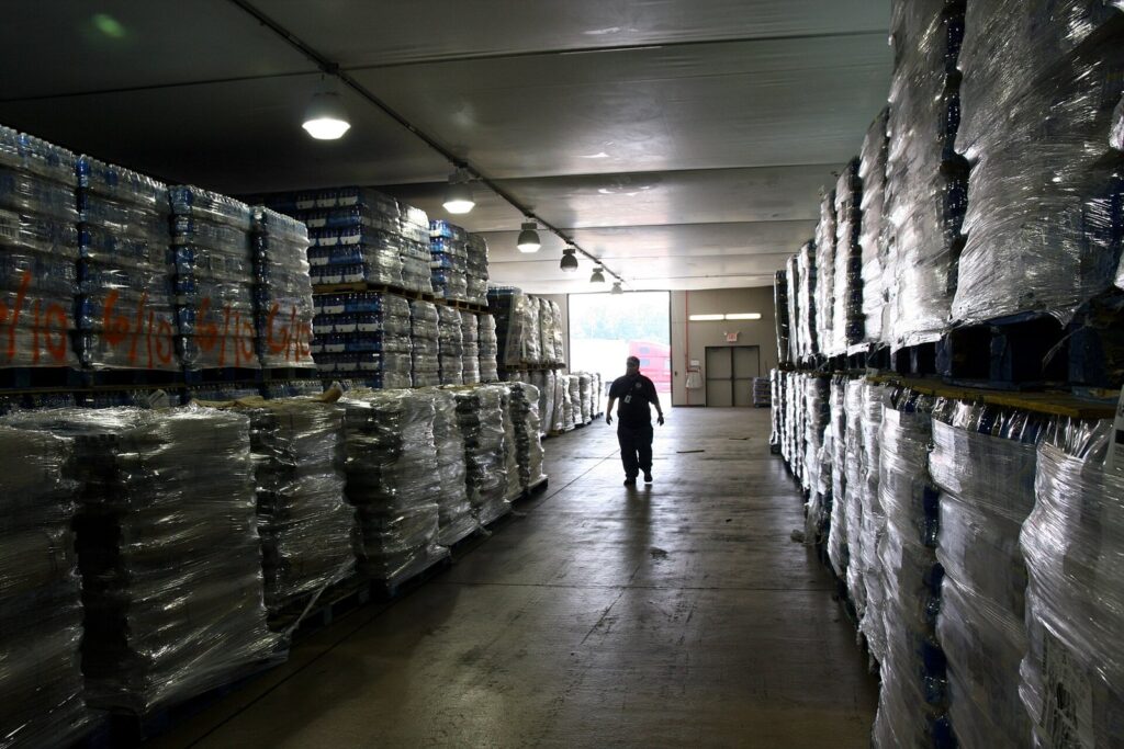 Warehouse aisle with stacked pallets